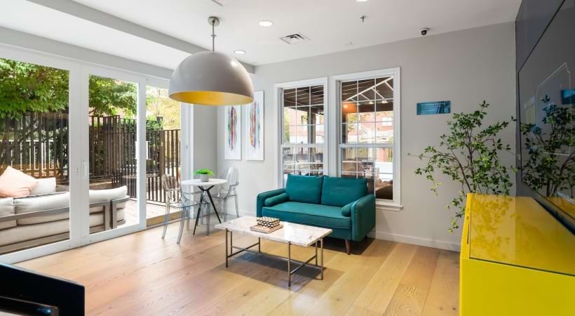 Resident Clubhouse with a Cozy Seating Area at Our Park Center Drive Apartments