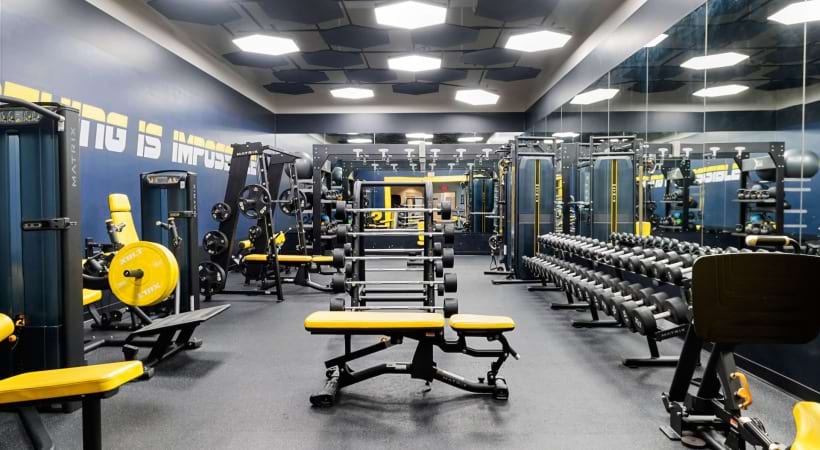 24/7 Fitness Center and Yoga Studio with Free Weights at Our Van Dorn Metro Apartments