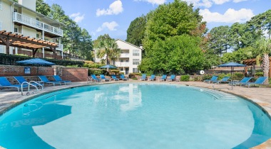 pool with lounge chairs