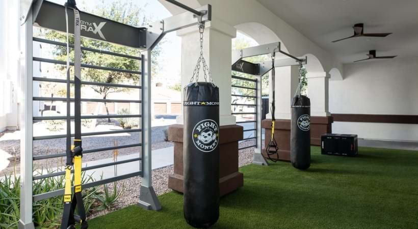 Punching Bag in the 24/7 Fitness Center with Outdoor Workout Area and Yoga/Spin Studio at Our Mesa Apartment Community