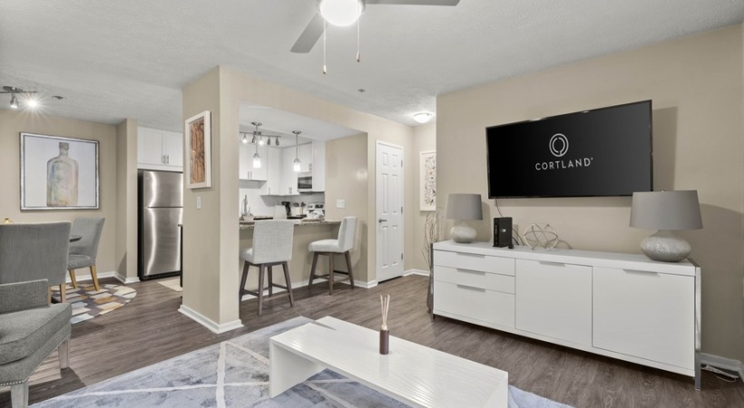 Living and Dining Area with Wood-Style Flooring at Our Apartments in Smyrna, GA