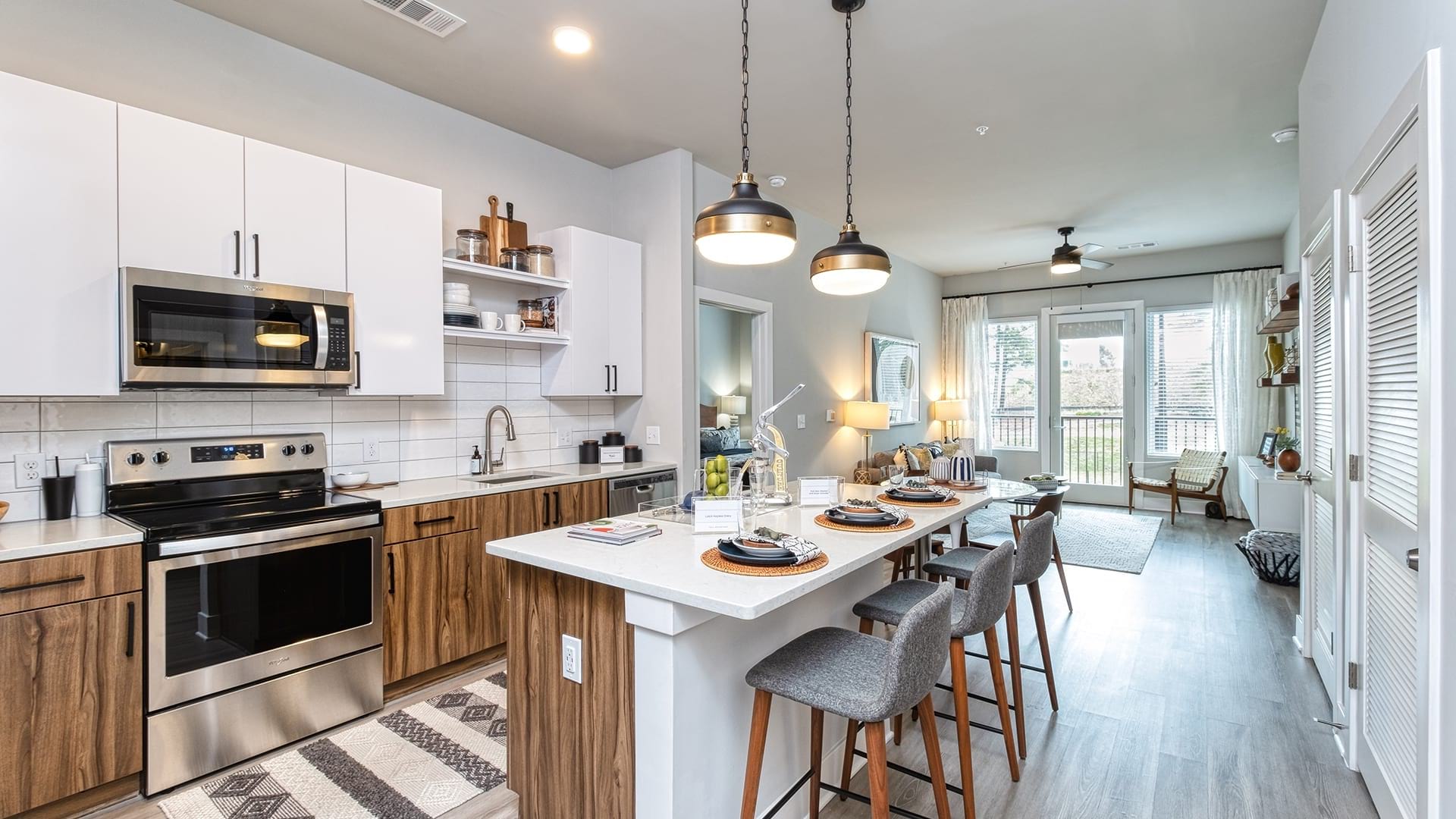 Upscale Apartment Kitchen with Two-Toned Modern Cabinets at Our Brookhaven Apartments
