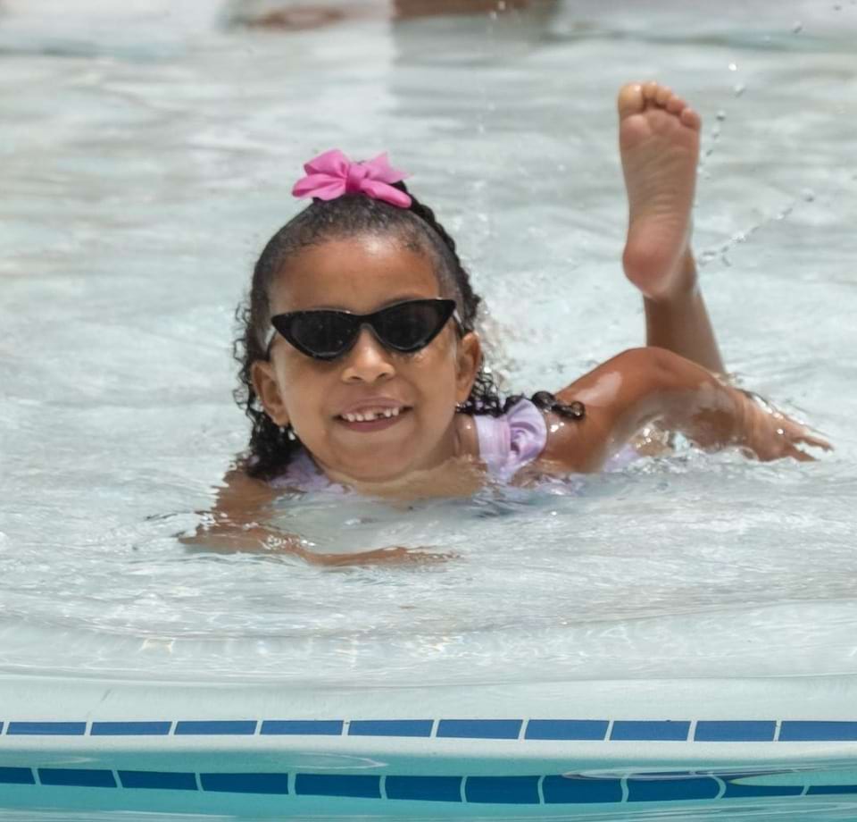 Child Swimming in the Pool at Our Cortland Apartments